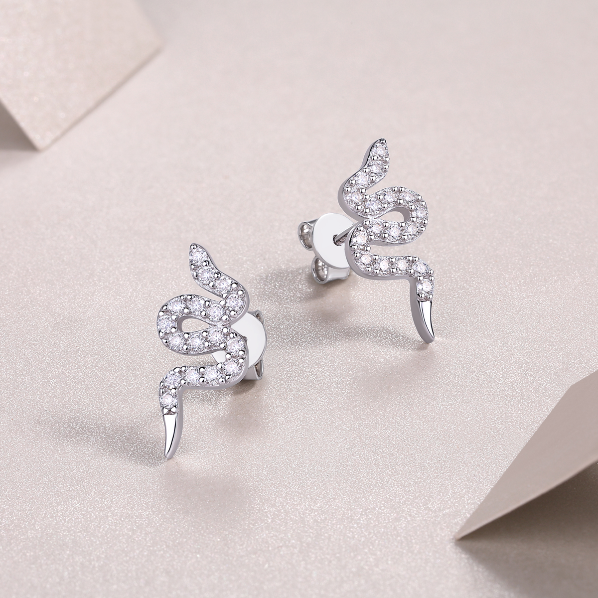 The Silver Snake Entwined Studs – Trendy Moissanite Earrings in Platinum-Plated S925 Silver