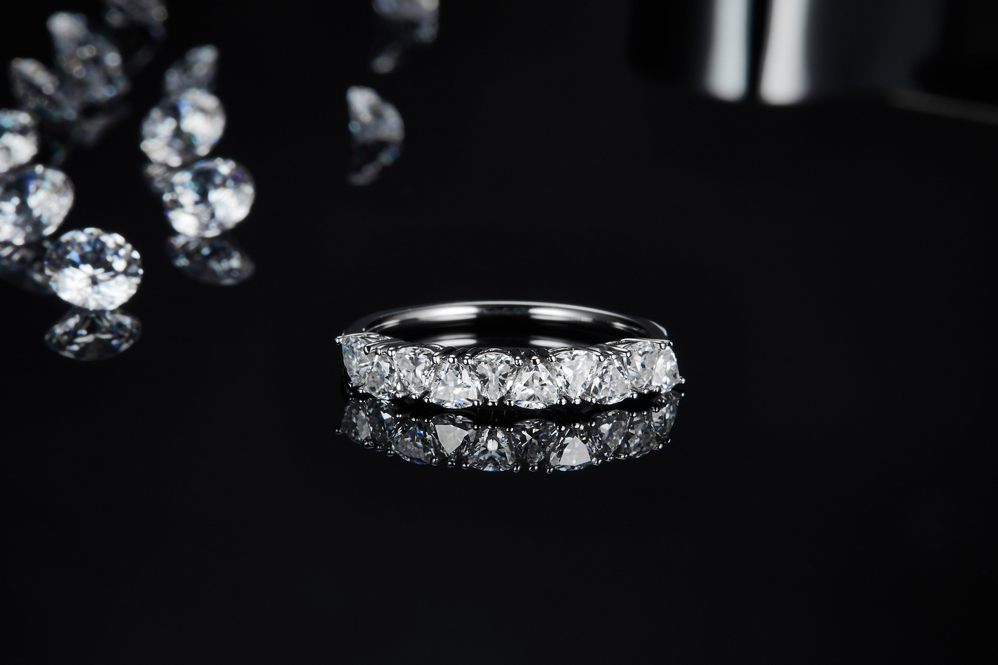 The Lumina Essence Ring - is crafted from S925 sterling silver plated with platinum and set with Moissanite stones.