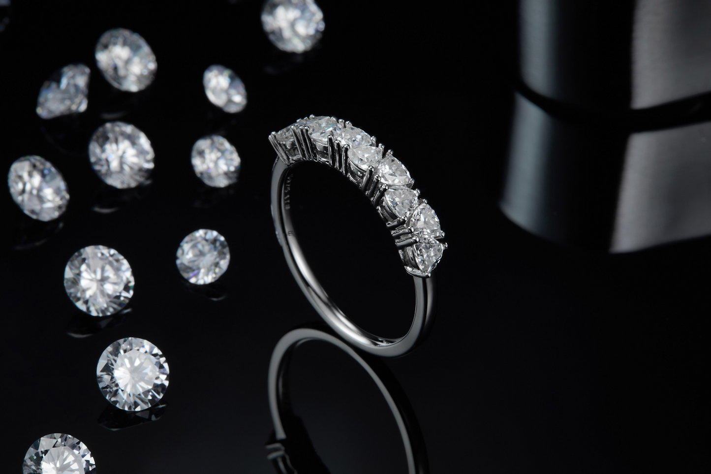 The Lumina Essence Ring - is crafted from S925 sterling silver plated with platinum and set with Moissanite stones.
